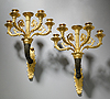 A fine pair of Empire gilt and patinated bronze five-light wall-lights